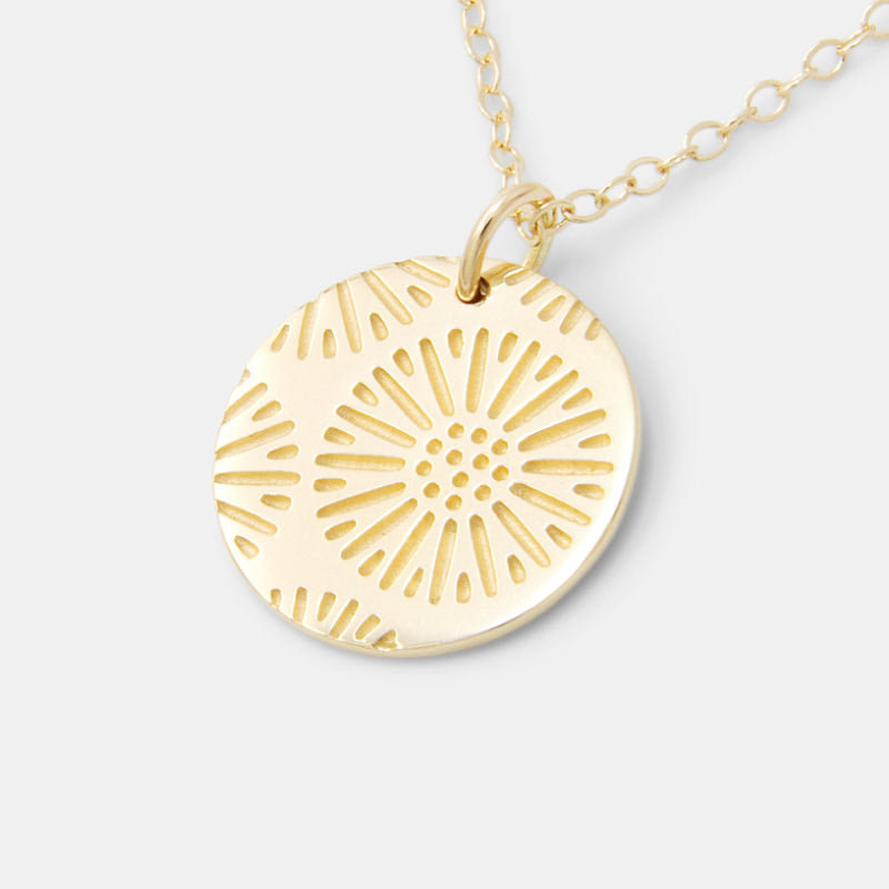 Solid gold pendant necklace with a coral texture design