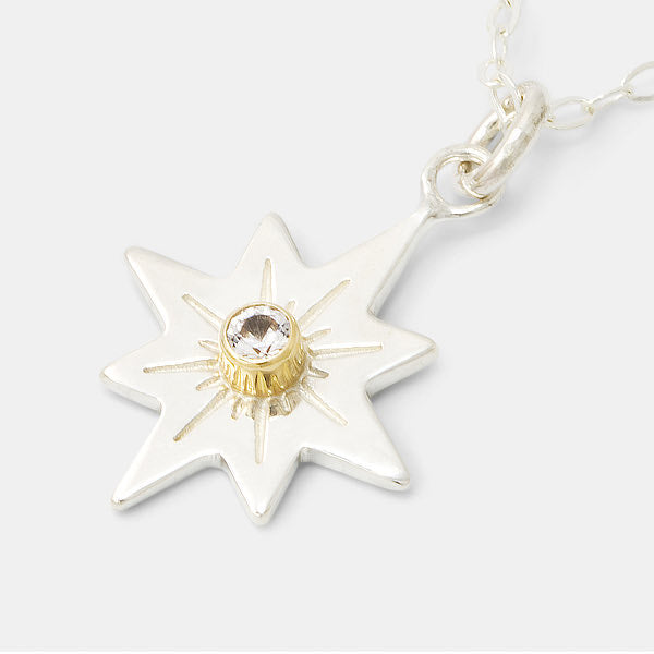 Guiding star silver pendant necklace with white sapphire and gold