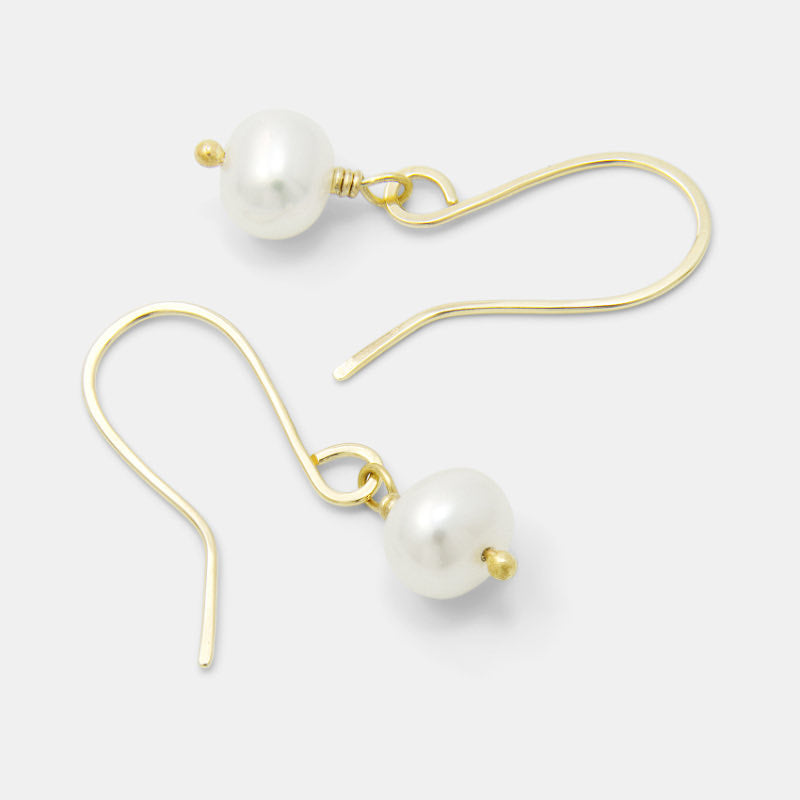 Solid gold and pearl drop earrings: shop for pearl jewellery.